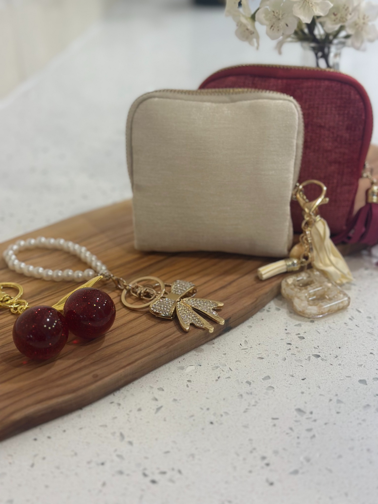 Two jewelry organizers styled with jewelry and accessories