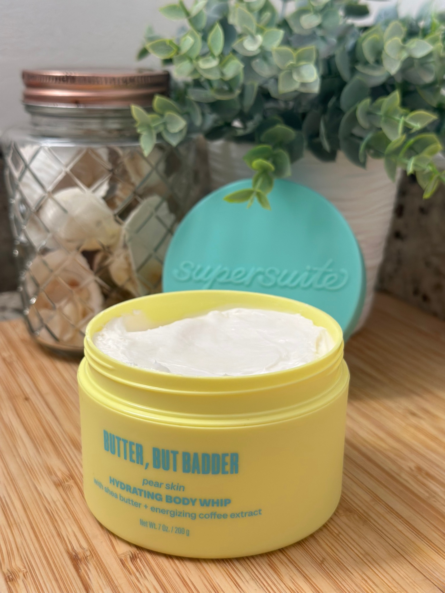 Supersuites body whip in an open yellow jar
